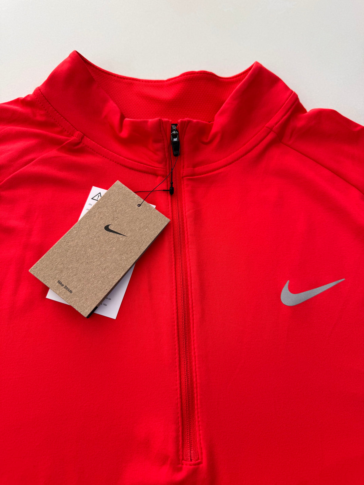 Nike stride dri-fit capa intermedia