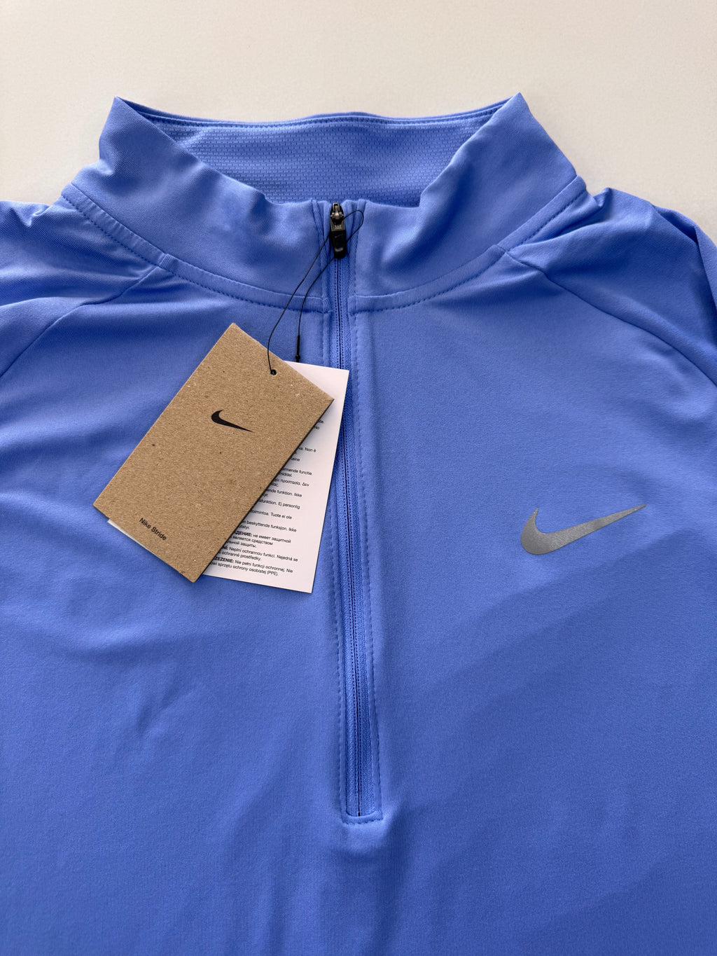 Nike stride dri-fit capa intermedia