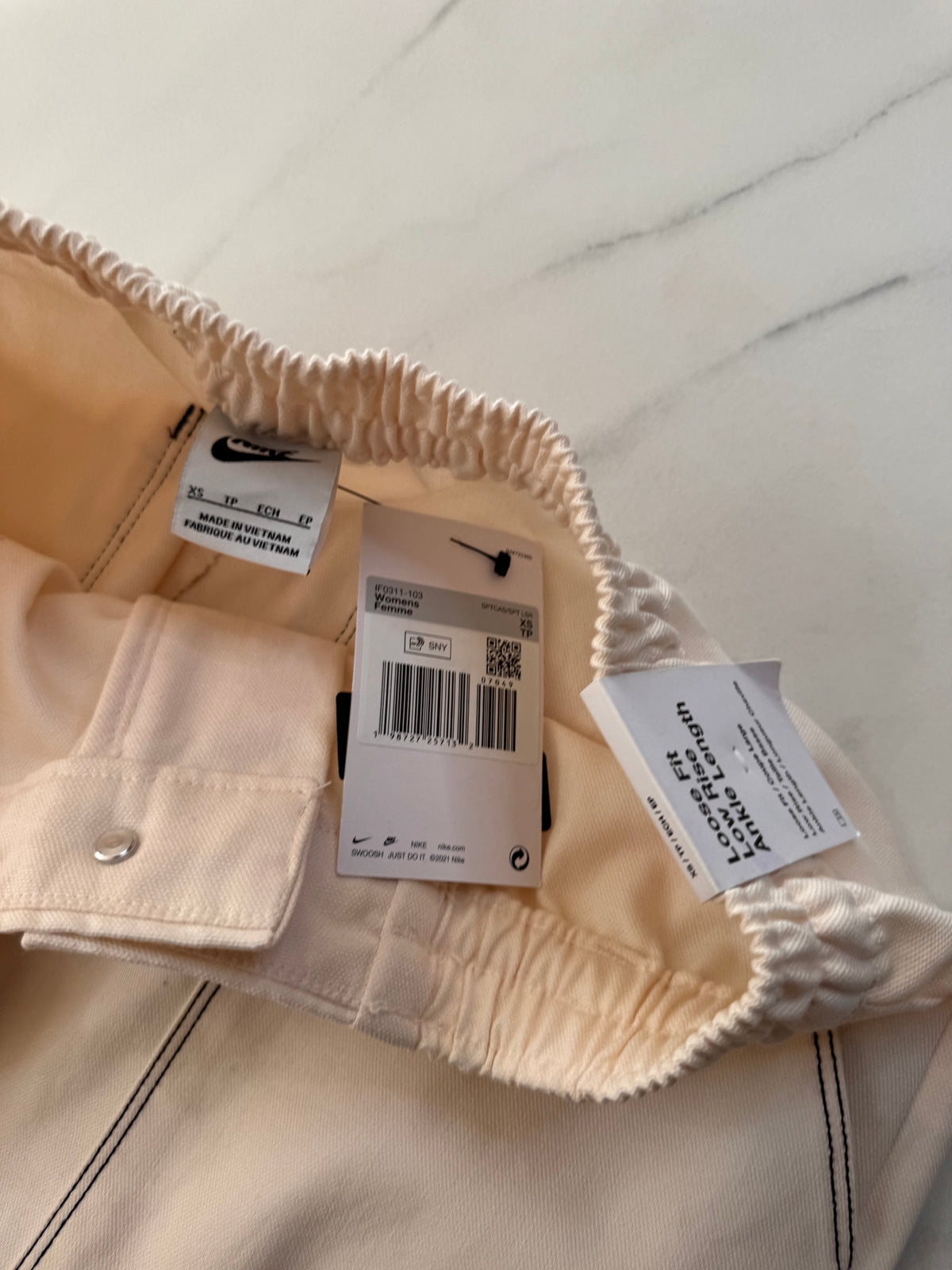 Nike Sportswear — Women’s Loose Low-Rise Carpenter Trousers