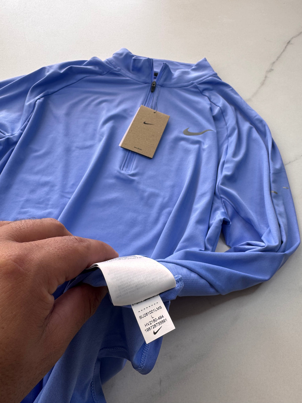 Nike stride dri-fit capa intermedia